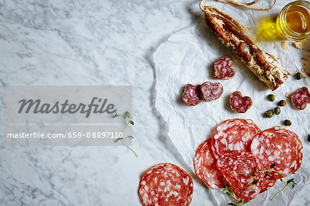 Fine meats and delicatessen. Served on a white marble