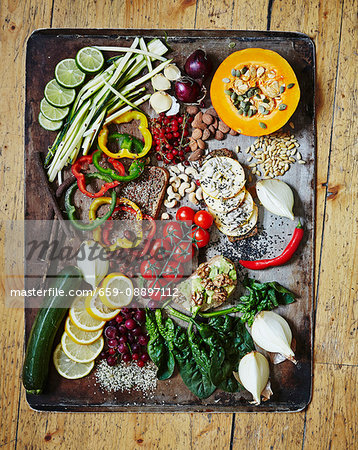 Various vegetables on a vintage tray Healthy greens