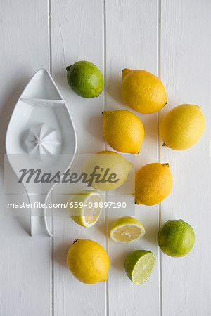Lemons and limes with the ceramic juicer Lemons and limes with the ceramic juicer