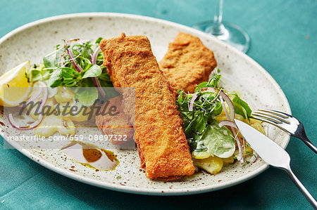 Baked carp with potato and lamb's lettuce