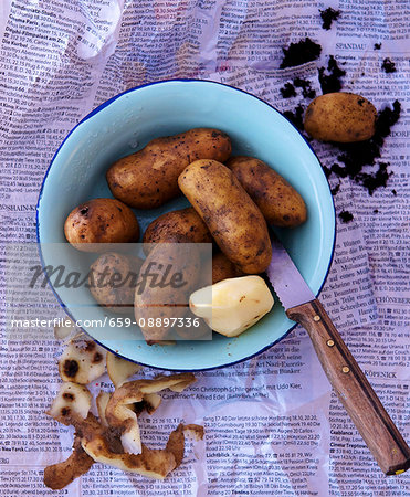 Peeling potatoes