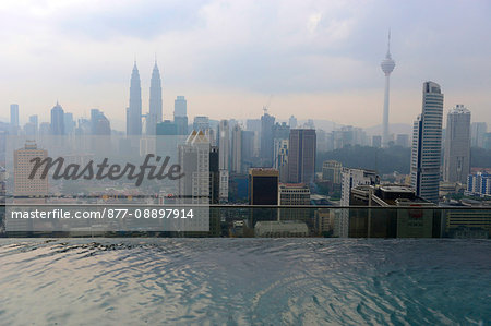 South-East Asia, Malaysia, Kuala Lumpur, the financial center and the Petronas towers, a swimming pool in the foreground