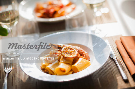 Paccheri con gamberi ed arancia (pasta with prawns and oranges, Italy)