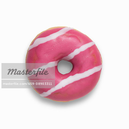 A pink strawberry doughnut filled with strawberry jam