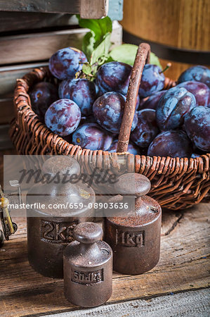 Plums in a wicker basket