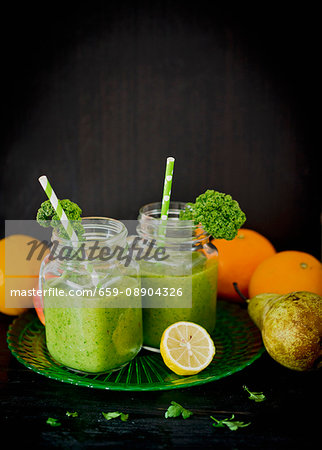 Green fruit smoothies with kiwi and parsley
