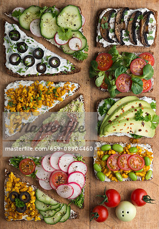 Wholemeal open sandwiches topped with soya quark and various vegetables