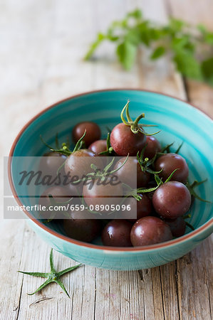 Cherry tomatoes in a ceramic bowl