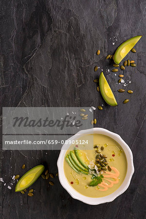 Chilled avocado soup with pumpkin seeds (seen from above)