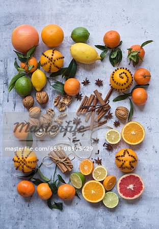 Assorted citrus fruits with nuts and spices Assorted citrus fruits with nuts and spices