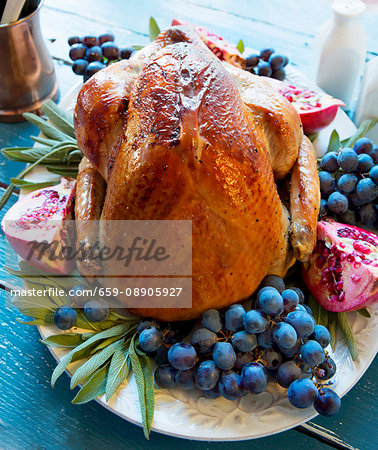Roast turkey with grapes, pomegranate and sage
