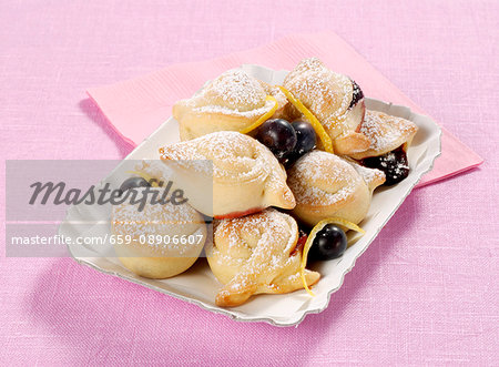 Sweet bread dough tortelli with jam and blueberries (Italy)