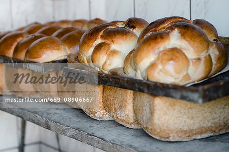 Hefezöpfe (sweet bread from southern Germany) and tin loaves (of sour dough and wholemeal rye bread) baked in a wood-fired oven