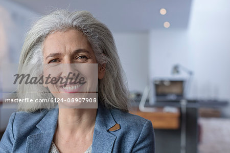 Portrait smiling, confident mature woman