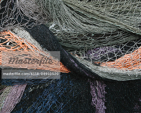 Close up of a pile of tangled up commercial fishing nets.