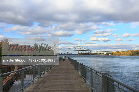 Old Montreal Port area, with Saint Lawrence River in autumn, Quebec, Canada.