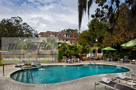 Daytime shot of backyard pool at an Amelia Island Inn, Hoyt House, Amelia Island, FL.