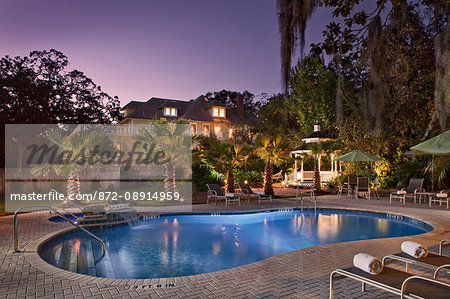 Twilight shot of backyard pool at an Amelia Island Inn, Hoyt House, Amelia Island, FL.