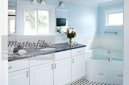 Bathroom with filled soaking tub, Maine Stay Inn, Kennebunkport, ME.