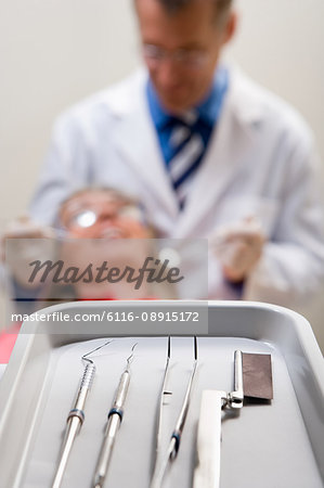 Tray with dental equipment on it