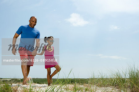 Father and daughter walking