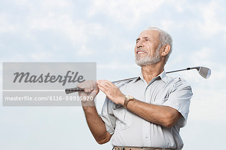 Man holding a golf club