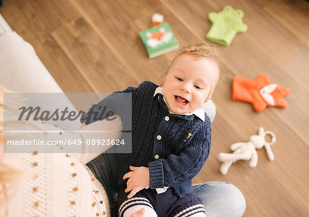 Mother holding baby on lap