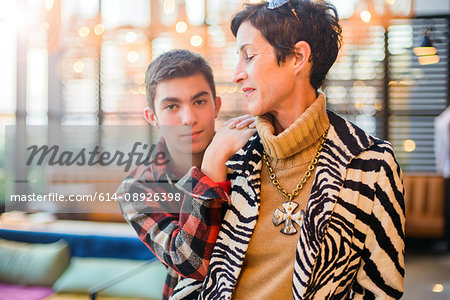 Teenage boy with stylish mother