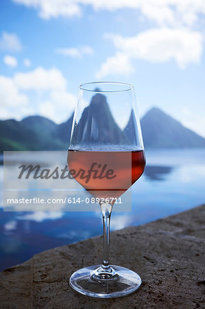 Glass of rose wine overlooking the Pitons, Saint Lucia, Caribbean