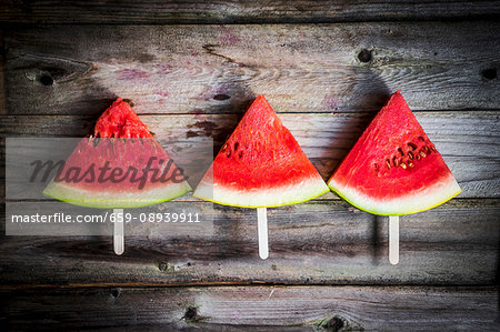 Watermelon slices on sticks