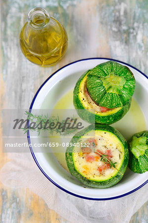 Round courgettes filled with ham and cheese