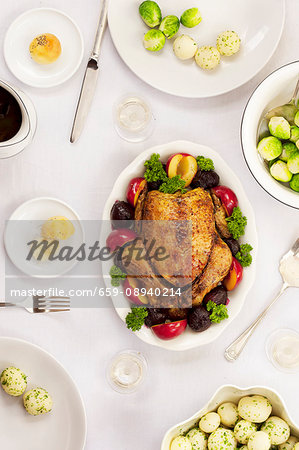 Roast chicken with potatoes and Brussels sprouts