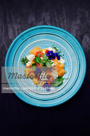 Tomato and mozzarella salad with melon Tomato and mozzarella salad with melon