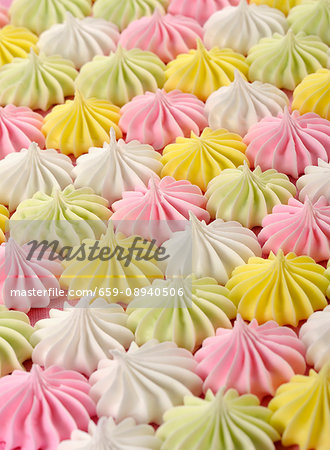 Pastel coloured meringues