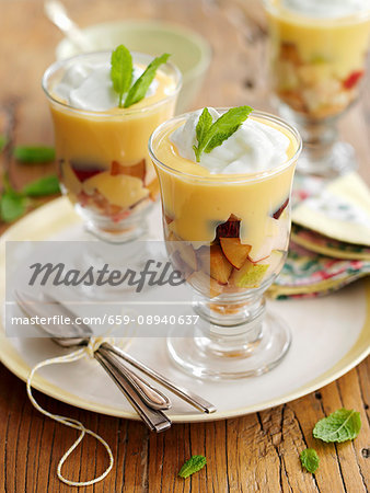 Trifle with fruit, cream and mint