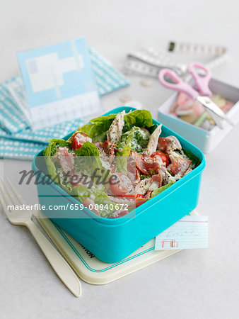 Caesar salad with chicken in lunch box