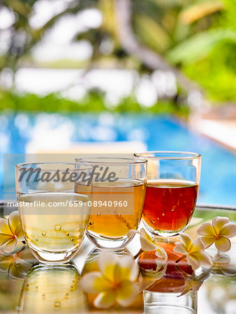 Various glasses of herb tea