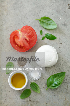 Ingredients for caprese: tomatoes, mozzarella and basil