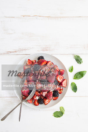 Berry salad with mint, basil and feta cheese