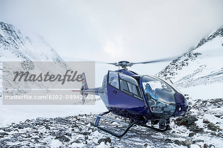 Helicopter in snowy landscape