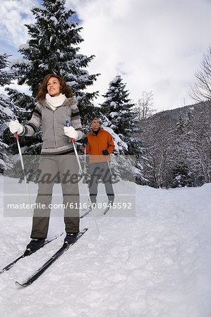 Mature couple skiing