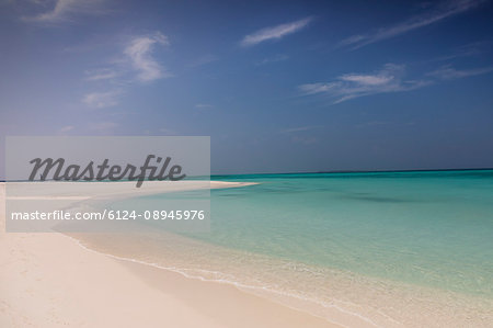 Tranquil blue tropical ocean beach