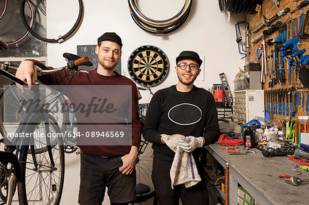 Technicians in bicycle workshop