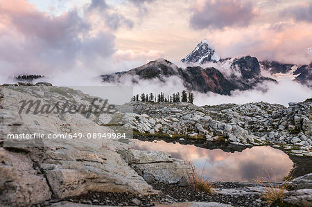 Clouds on snow covered mountains, Mount Baker, Washington, USA