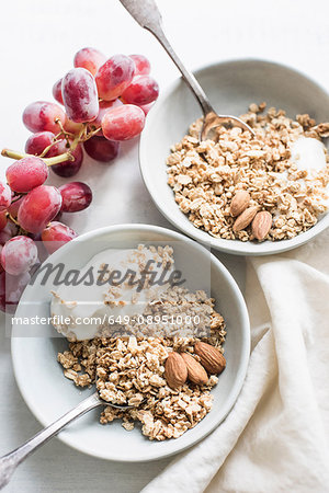 Bowls of cereal and yogurt