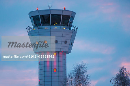 Air traffic control tower at dusk
