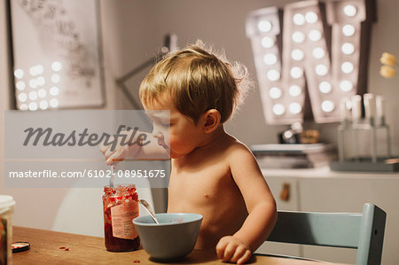 Boy eating jam