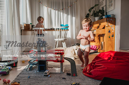 Brothers playing in room