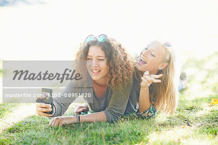 Happy friends taking selfie