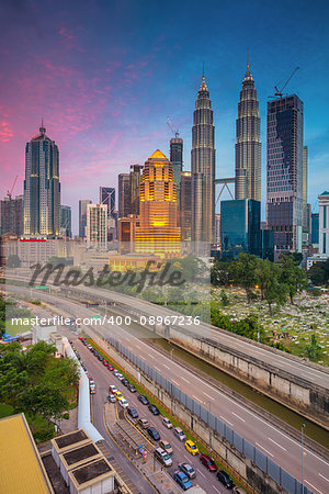 Cityscape image of Kuala Lumpur, Malaysia during twilight blue hour.